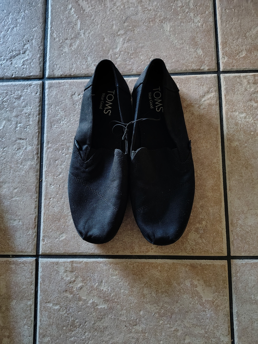 Toms Black Canvas Slip-Ons